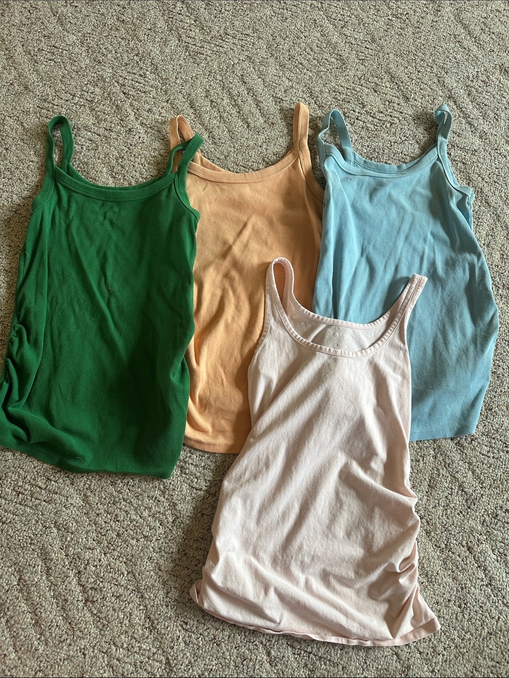 4 old navy small maternity tanks - some small stains